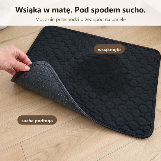 Mocz wsiąka w matę, pod spodem podłoga sucha